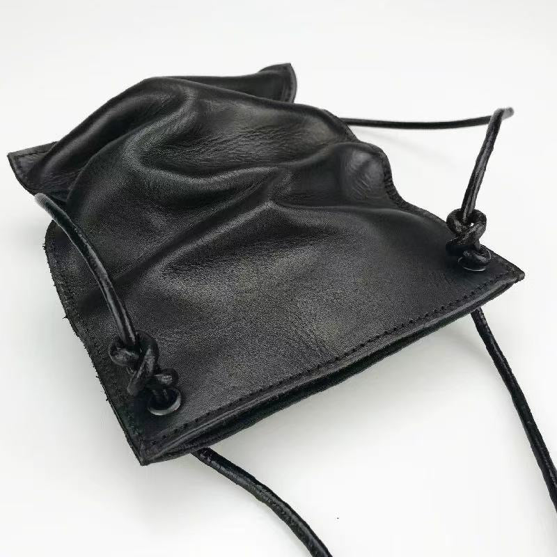 Monk’s key Leather Small Bag